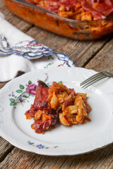 Homemade stuffed roasted red peppers with beans. Tavche gravche traditional Macedonian dish.