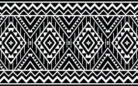Ethnic geometric print pattern design  Aztec repeating background texture in black and white. Fabric, cloth design, wallpaper, wrapping