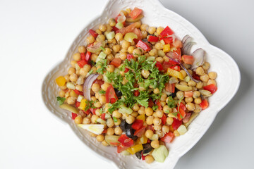 Chickpeas salad with chopped fresh vegetables