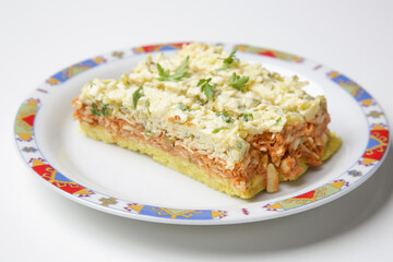 Slices of simple homemade salty cake on plate