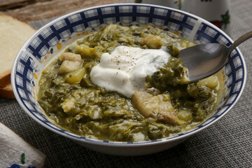 Collard dish. Delicious homemade coolard stew served in in a bowl.