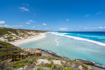 Fototapeta na wymiar A perfect day at 11 mile beach in Esperance, Western Australia. Vibrant blue water with perfect beach. 