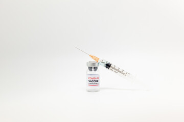 coronavirus vaccination glass bottle and a syringe, medication treatment vaccine of COVID-19...