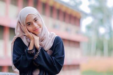 Fototapeta premium Young Asian Muslim woman smile to the camera.