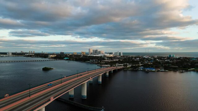 Amazing aerial time lapse (hyperlapse) of cars driving through a bridge at the Halifax River in Daytona Beach, Florida