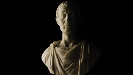 Fototapeta na wymiar Julius Caesar marble statue bust on black background