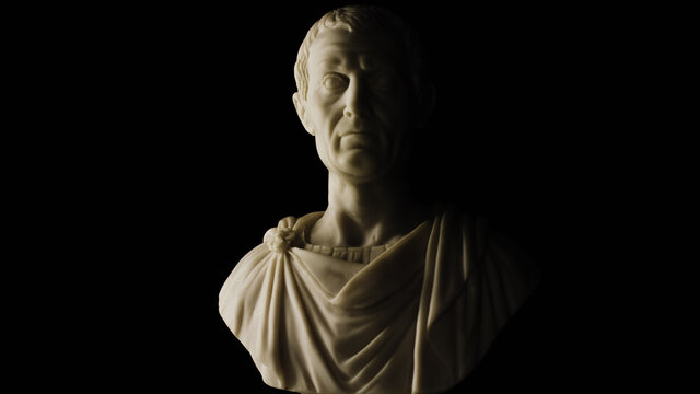 Julius Caesar marble statue bust on black background