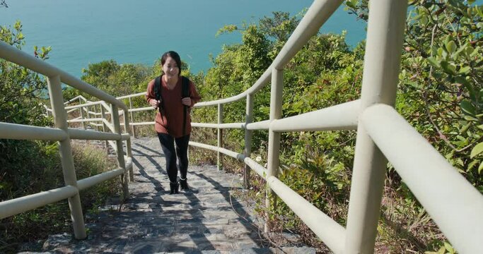 Woman go hiking and walk on the step