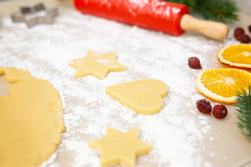 A hand holding a piece of food. heart in hands. Happy christmas