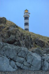 Lighthouse on the Marekan Cape. Sea of Okhotsk coast. Khabarovsk Krai, far East, Russia.