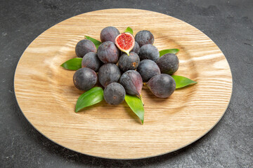 front view fresh sweet figs inside plate on dark background tree fruit dark taste photo