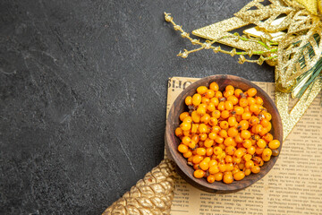 top view fresh yellow berries on dark background color fruit berry fresh photo free space