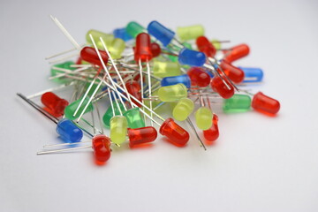 Heap of LED bulbs on white background. Colorful Light emitting diodes in a heap