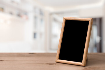 photo frame on the wooden table