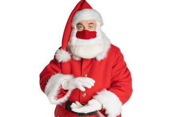 A man in a Santa Claus costume and a mask holds the place for insertion with his hands and looks into the camera on and isolated white background.