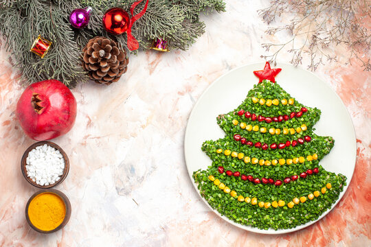 top view tasty green salad in new year tree shape with seasonings on light background meal health xmas color holiday photos