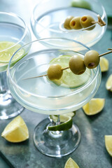 Glasses of fresh martini on table, closeup