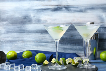 Glasses of fresh martini on table
