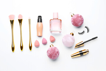 Christmas composition with cosmetics on white background