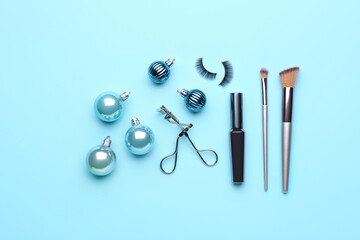 Christmas composition with cosmetics on color background