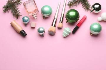 Christmas composition with cosmetics on color background