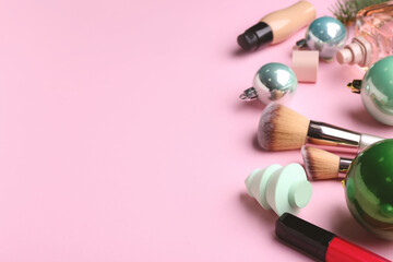 Christmas composition with cosmetics on color background
