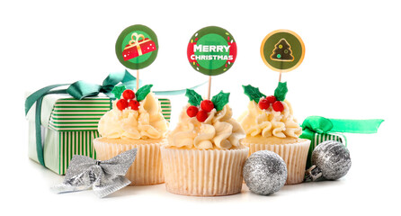 Tasty Christmas cupcakes on white background