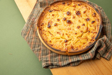 delicious round quiche with ham and homemade bacon