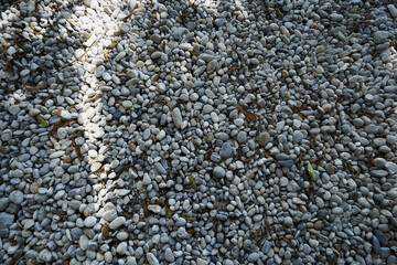 Small colorful gravel Pebbles stone texture on the ground