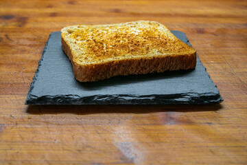 a delicious fresh bread with herb cream for the breakfast