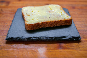a delicious fresh bread with herb cream for the breakfast
