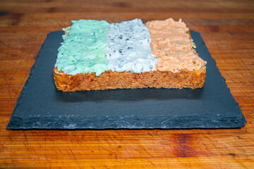 a delicious fresh bread with herb cream for the breakfast