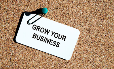 On the card attached to the comments board, the text of GROW YOUR BUSINESS.