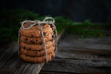 Chocolate cookies on wooden table.