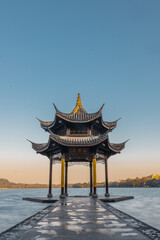 Sunrise view of Jixian pavilion, the landmark at the west lake in Hangzhou, China.