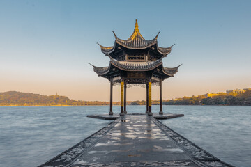 Sunrise view of Jixian pavilion, the landmark at the west lake in Hangzhou, China.