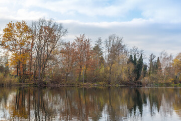 Panorama with reflections in the water at the Grube Fernie in Grossen-Linden close to Giessen, Germany