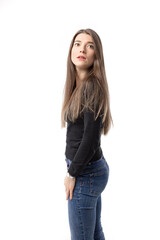 Beautiful young woman looking up with concerned expression.