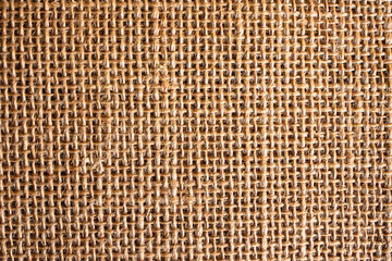 Jute hessian sackcloth canvas woven texture pattern background in light beige cream brown color - obrazy, fototapety, plakaty