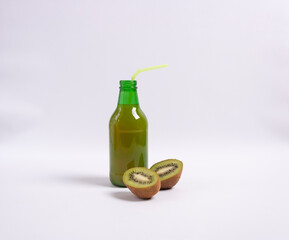 Kiwi juice on white background. Selective focus.