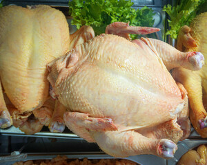fresh homemade chicken carcass is on the counter in the bazaar