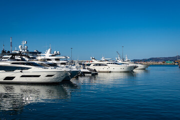 Sochi, Russia - December 07, 2020: Very expensive high-speed sailing yachts moored at berths of...