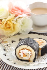 homemade mango Swiss roll in black color