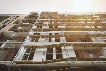 Construction of new building. unfinished facade of the house