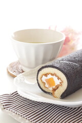 homemade mango Swiss roll in black color