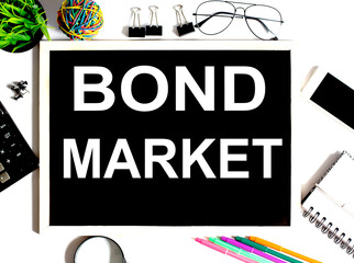 Bond Market - text on chalkboard with office tools
