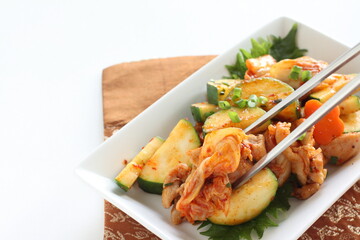 Korean food, cucumber and chicken stir fried with kimchi
