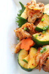 Korean food, cucumber and chicken stir fried with kimchi
