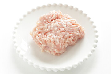 Prepared minced chicken on dish for cooking ingredient