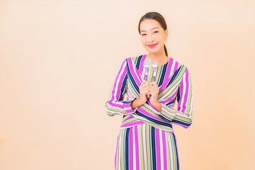 Portrait beautiful young asian woman with fork and spoon ready to eat